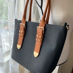 Smart looking black and tan with gold studs and gold hardware PU leather purse